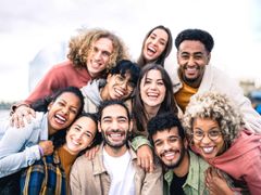 Diverse group of people smiling and laughing